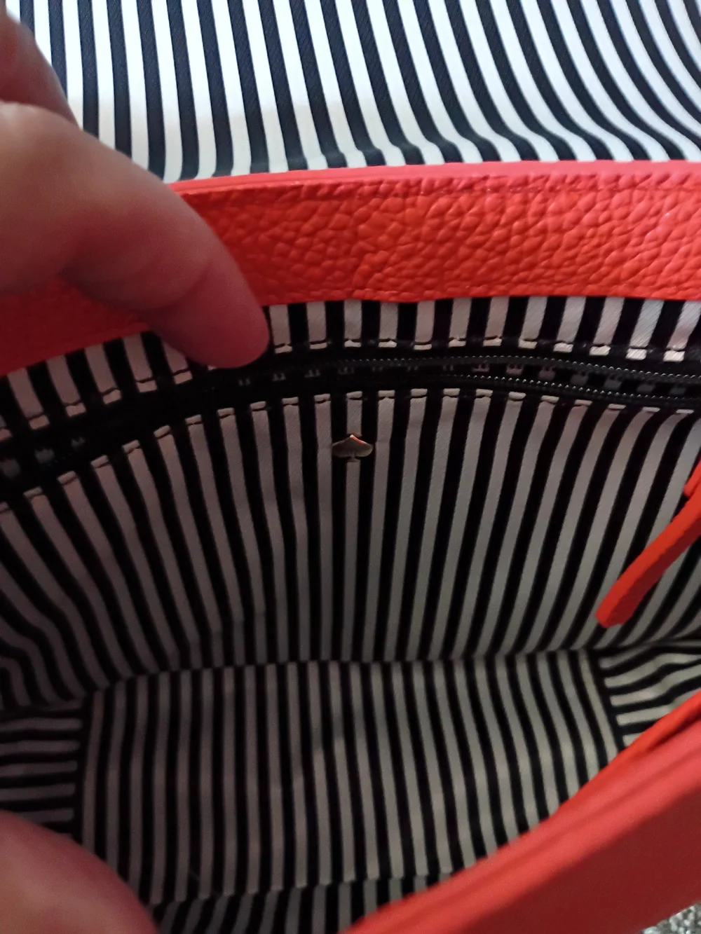 kate spade coral pebbled leather crossbody with tassel